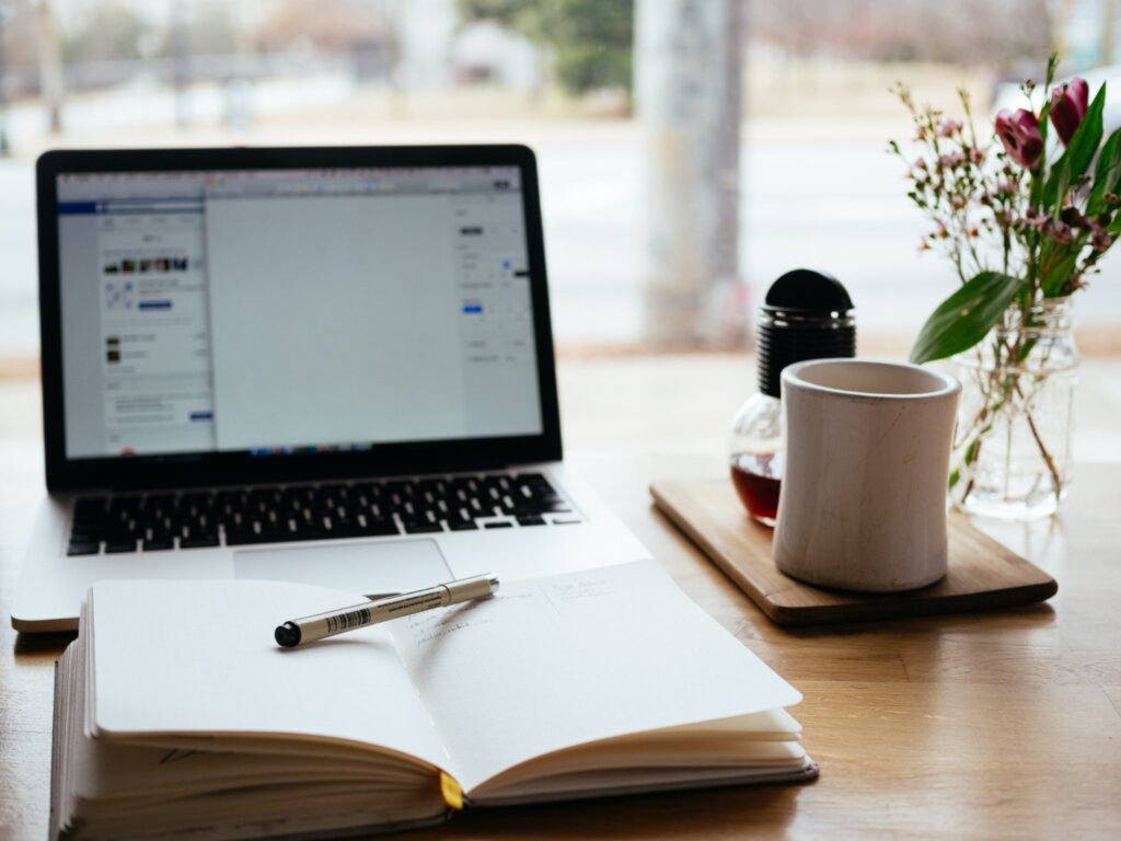 laptop and book